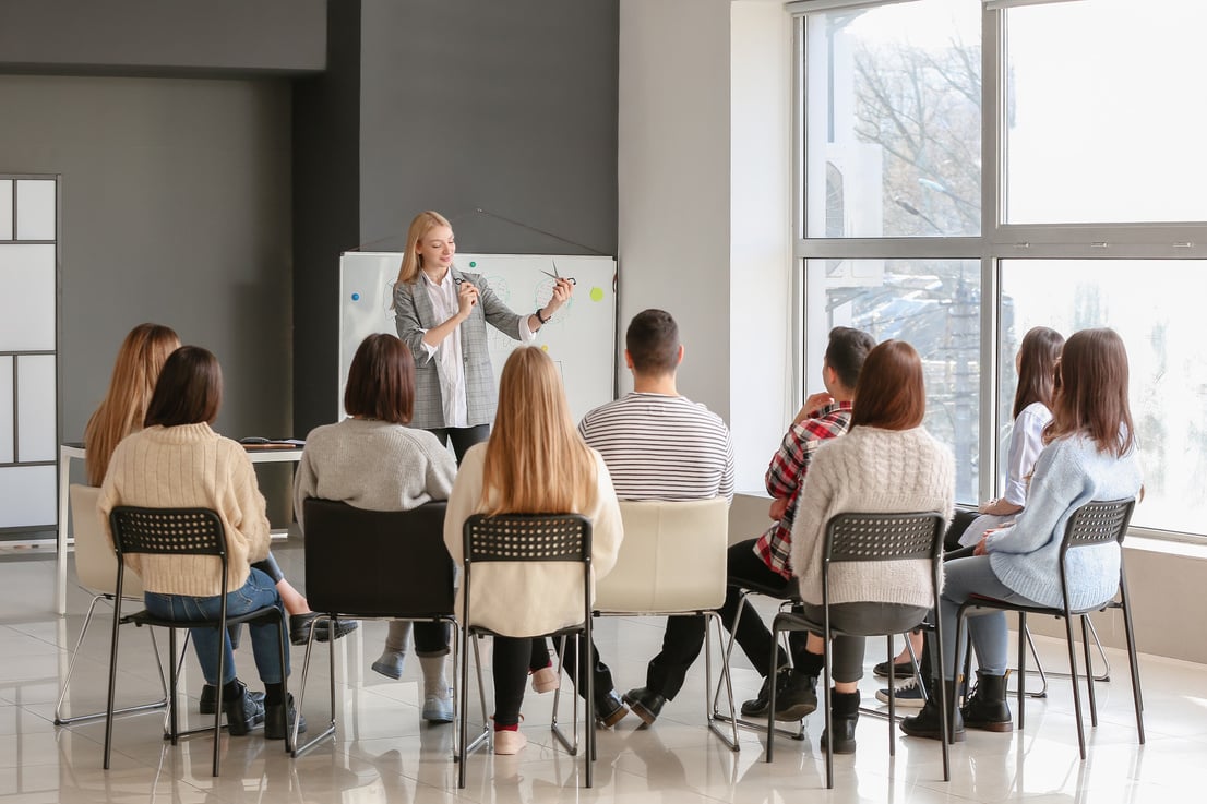 Group of People with Professional Hairstylist in Hair Styling Course